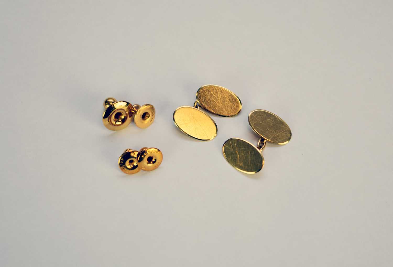 A cased set of 18ct gold cufflinks and studs