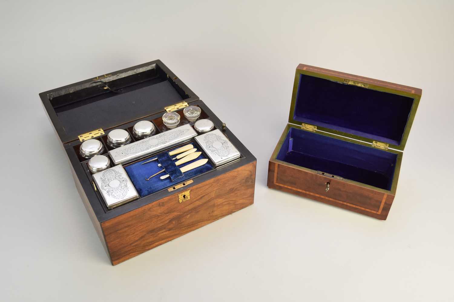 A 19th century cased silver plated mounted travelling vanity set