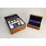 A 19th century cased silver plated mounted travelling vanity set