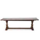 An oak refectory type dining table