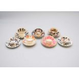 A group of English porcelain teacups and saucers, early-mid 19th century including Coalport