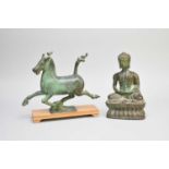 A Chinese bronze figure of a horse and a bronze Buddha