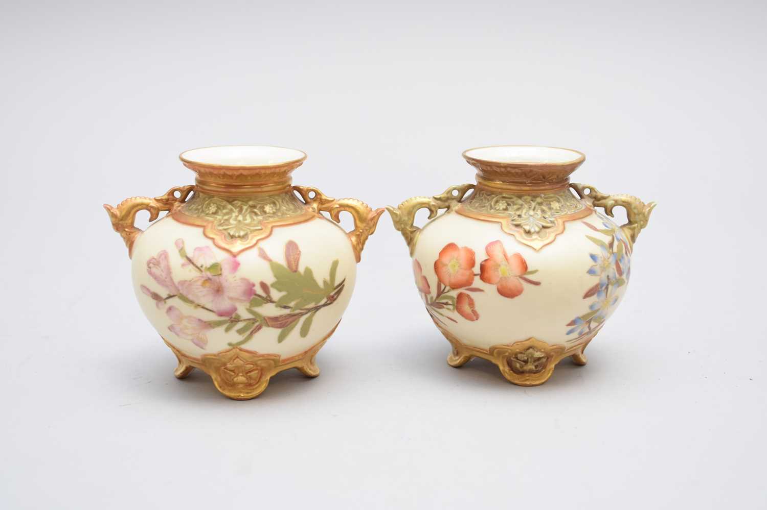 A pair of Royal Worcester vases