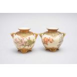 A pair of Royal Worcester vases