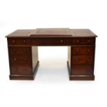 A Victorian mahogany veneered twin pedestal desk