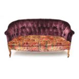 An Edwardian button-back velour upholstered sofa