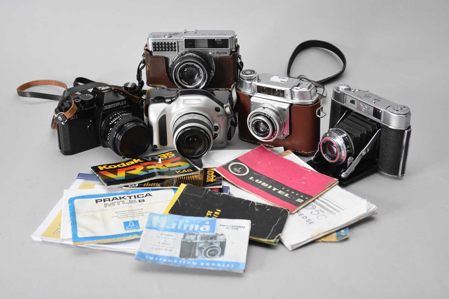 A Nikon 35mm SLR and various other roll film cameras