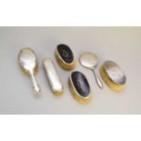 A collection of silver mounted dressing table wares