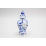 A Dutch Delft vase and cover