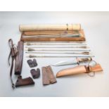 A Buchanan longbow, a group of arrows, a Bowie knife and archery accessories