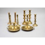 Four pairs of brass candlesticks and two chamber sticks