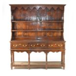 A good 18th century style oak and burr oak dresser by Bylaw