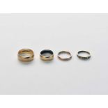 Four 9ct gold bands