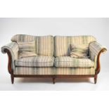 A walnut framed upholstered lounge suite of Chesterfield type