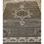 A silver grey ground Turkish carpet