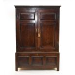 An 18th century oak livery cupboard