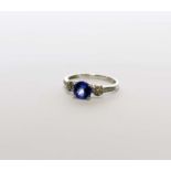 A 9ct white gold tanzanite and diamond ring