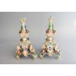 A pair of Meissen porcelain flower-encrusted candelabra bases, late 19th century