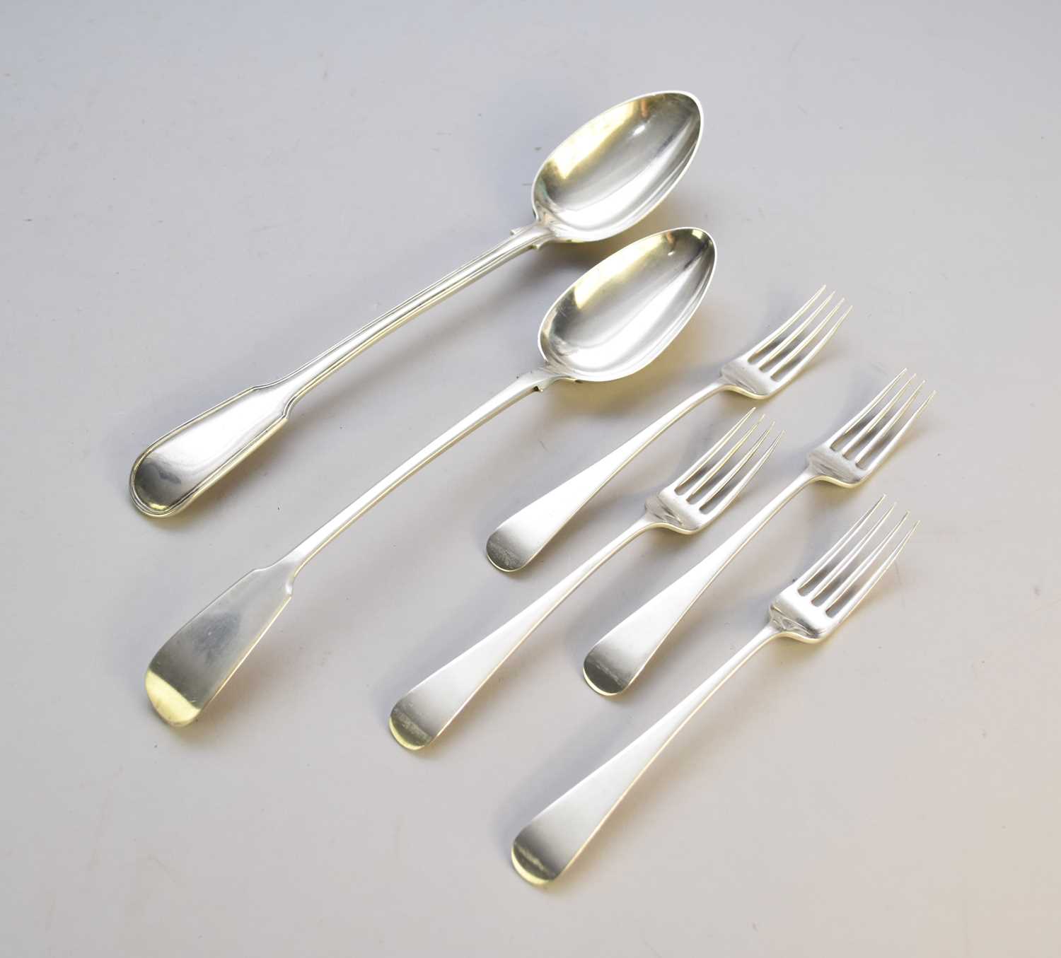 Two silver basting spoons and four silver forks