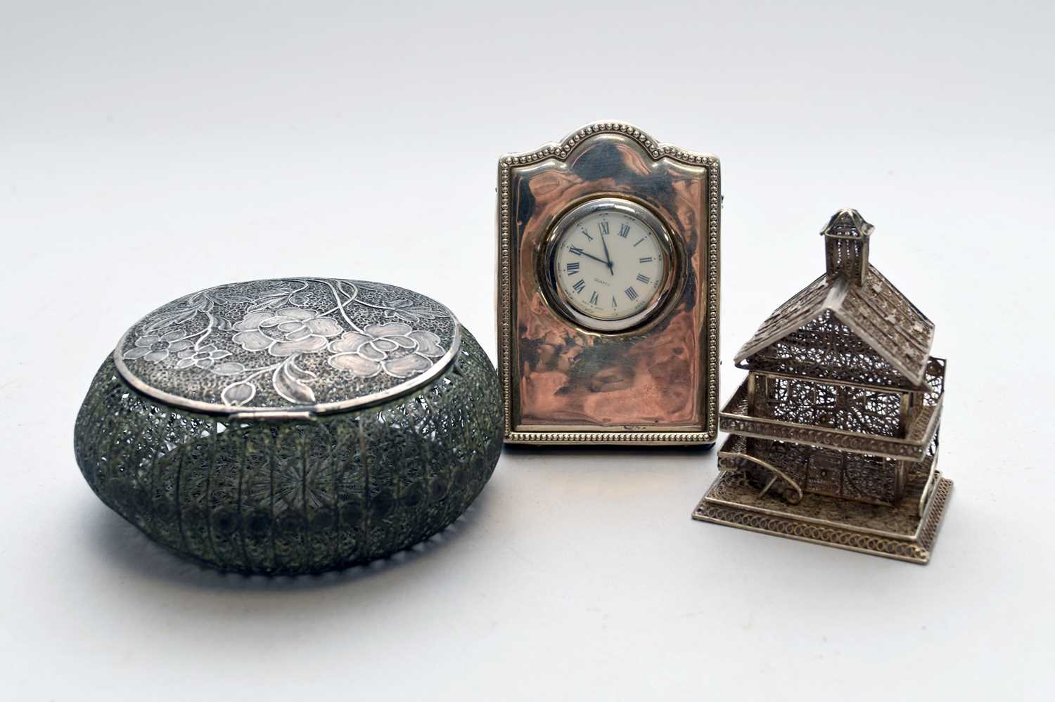 A silver mounted bedside timepiece