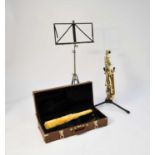 A cased Blessing alto saxophone with accessories