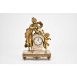 An early 20th century, French gilt metal and marble figural mantel clock