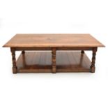 An 18th century style oak coffee table by Arighi Bianchi