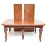 A Victorian, well-figured and of good colour, oak extending dining table