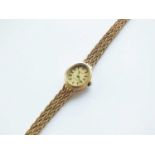 A 9ct gold Tissot bracelet quartz wristwatch