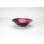 Peter Sparrey (b.1967) a stoneware bowl with copper and red glaze