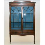 An Edwardian inlaid display cabinet