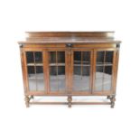 A 20th century oak glazed bookcase