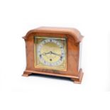 A walnut cased Elliott mantel clock for Charles Fox, Bournemouth