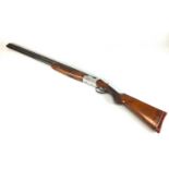 A Webley and Scott 12 bore double barrel shotgun, over and under