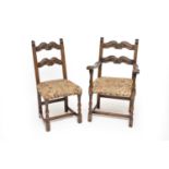 A set of five 17th century style carved oak dining chairs