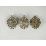 Three Argyll and Sutherland glengarry badges, die-stamped white metal (3)