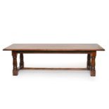 A reproduction oak refectory dining table by Arighi Bianchi