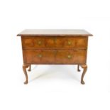 A George II walnut feather-banded and inlaid walnut lowboy type table