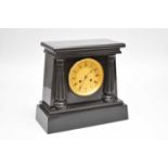 A 19th century black marble mantel clock by William Johnson