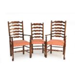 A set of ten (8+2) reproduction oak ladder-back dining chairs