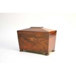 A Victorian rosewood tea caddy