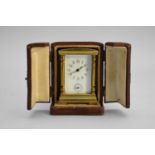 A French gilt brass miniature carriage alarm clock