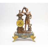 Two French gilt metal and marble figural mantel clocks