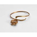 A 9ct gold snake ring and bangle