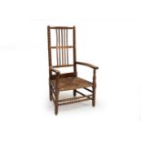 A 19th/20th century spindle-back rush-seated chair