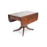 A late Victorian mahogany Pembroke type pedestal drop-leaf table