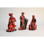 Three Royal Doulton flambe figures