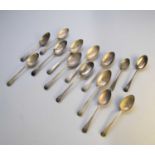 A set of silver Old English pattern spoons