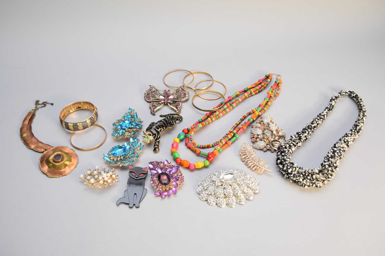 A large collection of various pieces of costume jewellery