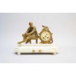 Two French bronze and marble figural mantel clocks